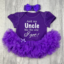 Load image into Gallery viewer, Baby girls short sleeve dark purple tutu romper with matching bow headband above. The tutu romper features white glitter lettering saying Ain't no Uncle like the one I Got!
