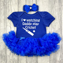 Load image into Gallery viewer, Baby girls royal blue tutu romper with matching clip bow headband above. The tutu romper features white cricket bat and ball design with text above saying I love watching Daddy play Cricket