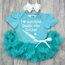 Load image into Gallery viewer, Baby girls green tutu romper with matching clip bow headband above. The tutu romper features white cricket bat and ball design with text above saying I love watching Daddy play Cricket