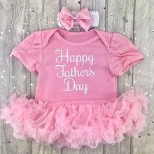 Load image into Gallery viewer, Baby girls short sleeve light pink tutu romper with bow headband above. The tutu romper features white script lettering saying Happy Father's Day.
