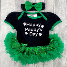 Load image into Gallery viewer, Baby Girls short sleeve black and green sequin tutu romper with bow headband above. The tutu romper features white glitter four leaf clover design with lettering in the middle saying Happy Paddy's Day.