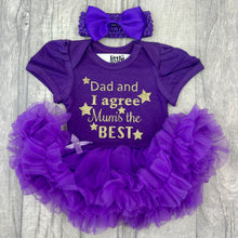 Load image into Gallery viewer, Baby girls short sleeve purple tutu romper with bow headband above. The tutu romper features gold glitter stars design and lettering saying Dad and I agree Mum's the Best.
