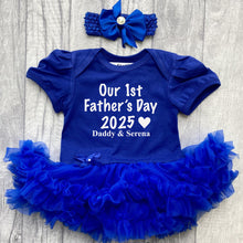 Load image into Gallery viewer, Baby girls short sleeve royal blue tutu romper with bow headband above. The tutu romper features a white glitter lettering design saying Our 1st Father's Day 2025 Daddy & Daughter's Name.