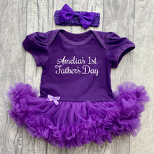 Load image into Gallery viewer, Baby girls short sleeve dark purple tutu romper with bow headband above. The tutu romper features white script lettering saying Personalised Name's 1st Father's Day.