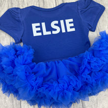 Load image into Gallery viewer, The back of baby girls short sleeve royal blue tutu romper, features personalised name in white glitter capital letters.