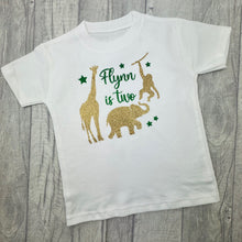 Load image into Gallery viewer, White t-shirt with gold glittery animals and green text.