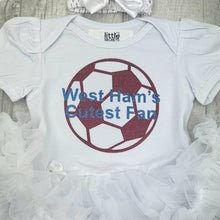 Load image into Gallery viewer, Baby girls short sleeve white tutu romper with bow headband above. The tutu romper features a maroon football design with blue lettering central over the top saying West Ham's Cutest Fan.
