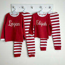 Load image into Gallery viewer, Personalised Red and White Wide Stripe Festive Pyjamas, White Glitter Script Style Name, Boys & Girls Christmas PJ's