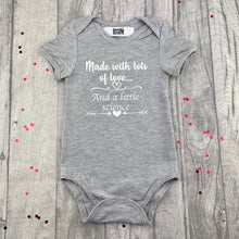 Load image into Gallery viewer, Made With Lots Of Love And A Little Science White Glitter Design, Newborn Short Sleeved Romper