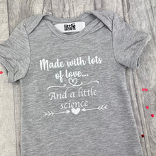 Load image into Gallery viewer, Made With Lots Of Love And A Little Science White Glitter Design, Newborn Short Sleeved Romper