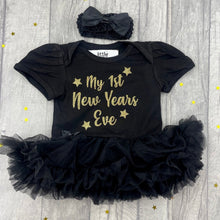 Load image into Gallery viewer, Baby Girls Short Sleeve Black Tutu Romper with Bow Headband above. The tutu romper features gold glitter stars design with script lettering in the middle saying My 1st New Years Eve.