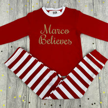 Load image into Gallery viewer, Personalised Girls & Boys 'Believes' Christmas Pyjamas, Red And White Or Red And Green Stripe