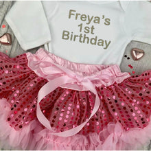 Load image into Gallery viewer, Girls 1st Birthday Sequin Outfit, Personalised White Romper with gold writing saying 1st birthday and a pink Sequin Tutu Skirt satin ribbon