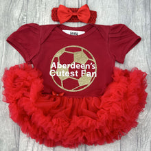 Load image into Gallery viewer, Baby girls red short sleeve tutu romper with bow headband above. The tutu romper features gold glitter football design and white text central over the top saying Aberdeen&#39;s Cutest Fan.
