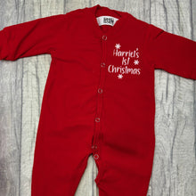 Load image into Gallery viewer, Red Sleepsuit featuring white snowflakes design and lettering saying Personalised Name&#39;s 1st Christmas
