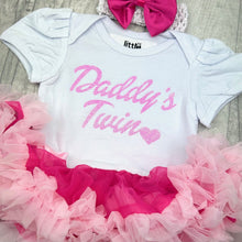 Load image into Gallery viewer, Baby girls short sleeve white and pink tutu romper with bow headband above. The tutu romper features pink glitter lettering saying Daddy&#39;s Twin.

