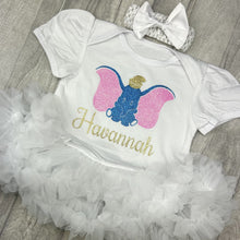 Load image into Gallery viewer, Side View of Baby girls short sleeve white tutu romper with matching bow headband, the tutu romper features a cute light pink and blue Dumbo design with gold personalised name underneath
