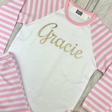 Load image into Gallery viewer, Personalised Pink and White Girls Pyjamas, Gold Glitter Text
