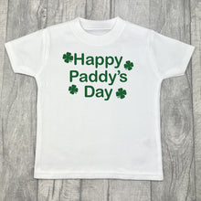 Load image into Gallery viewer, Children&#39;s white t-shirt, features green glitter four leaf clover design with lettering in the middle saying Happy Paddy&#39;s Day.
