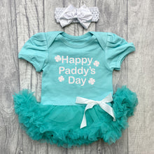 Load image into Gallery viewer, Baby Girls short sleeve green tutu romper with bow headband above. The tutu romper features white glitter four leaf clover design with lettering in the middle saying Happy Paddy&#39;s Day.
