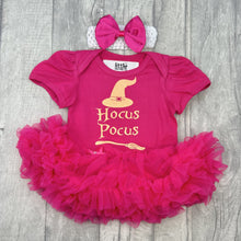 Load image into Gallery viewer, Baby girls dark pink tutu romper with matching bow headband above. The tutu romper features a bright orange glitter witch hat and broomstick design with lettering saying Hocus Pocus
