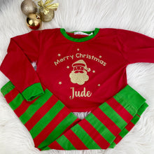 Load image into Gallery viewer, Red and Green Striped Pyjama Set. The top features gold glitter Santa design with lettering Merry Christmas, Name.
