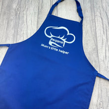 Load image into Gallery viewer, Blue Kids Apron featuring a White Glitter Chef Hat design with Personalised Name in the middle and lettering saying Mum&#39;s little helper underneath
