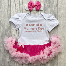 Load image into Gallery viewer, Baby girls short sleeve white with pink tutu romper and matching bow headband above. The tutu romper features rose gold text design saying Our 1st Mother&#39;s Day Mummy &amp; Name.
