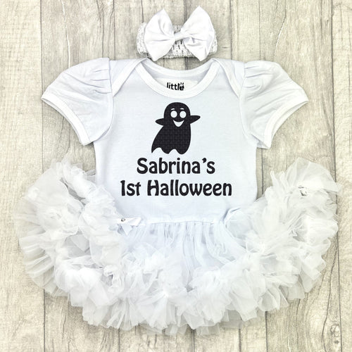 Baby girls white short sleeve tutu romper with bow headband above. The tutu romper features ghost design and lettering underneath saying Name's 1st Halloween