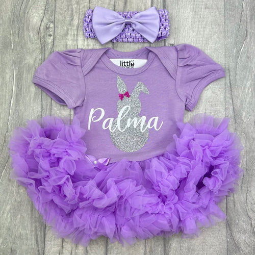 Baby girl short sleeve light purple tutu romper with bow headband. The tutu romper features a silver bunny design with small bow and personalised name in white over the top in the middle.