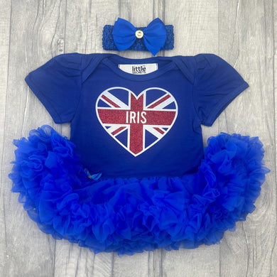 Baby girls short sleeve royal blue tutu romper with bow headband above. The tutu romper features a union jack love heart design with personalised name inside.