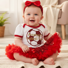 Load image into Gallery viewer, Baby in red and white outfit with soccer ball design
