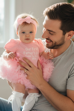 Load image into Gallery viewer, Daddy holding a baby girl in a pink outfit with a tutu, sitting on a carpeted floor.
