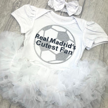 Load image into Gallery viewer, Baby outfit with &#39;Real Madrid&#39;s Cutest Fan&#39; text and football design on a white tutu romper. Matching headband above.
