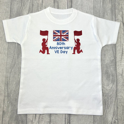White t-shirt featuring red and blue union jack and soldiers design with lettering in the middle saying 80th Anniversary VE Day.