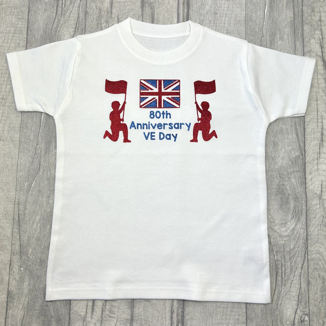 White t-shirt featuring red and blue union jack and soldiers design with lettering in the middle saying 80th Anniversary VE Day.