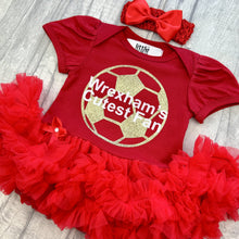 Load image into Gallery viewer, Red tutu romper with bow headband, featuring a gold football design and white text over the top saying &#39;Wrexham&#39;s Cutest Fan&#39;.
