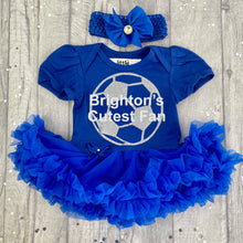 Load image into Gallery viewer, Baby Girls Brighton&#39;s Cutest Fan Blue Tutu dress Romper, Featuring a Silver Football and White text. With matching Blue headband with diamante clip bow.
