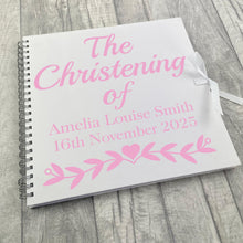 Load image into Gallery viewer, Spiral bind white large scrapbook with white ribbon tie fasten. The cover of the scrapbook features light pink lettering saying The Christening of Personalised Name and Date.
