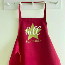 Load image into Gallery viewer, Adult Personalised Star Baker Apron. Gold star baker design with white personalised lettering, Red apron
