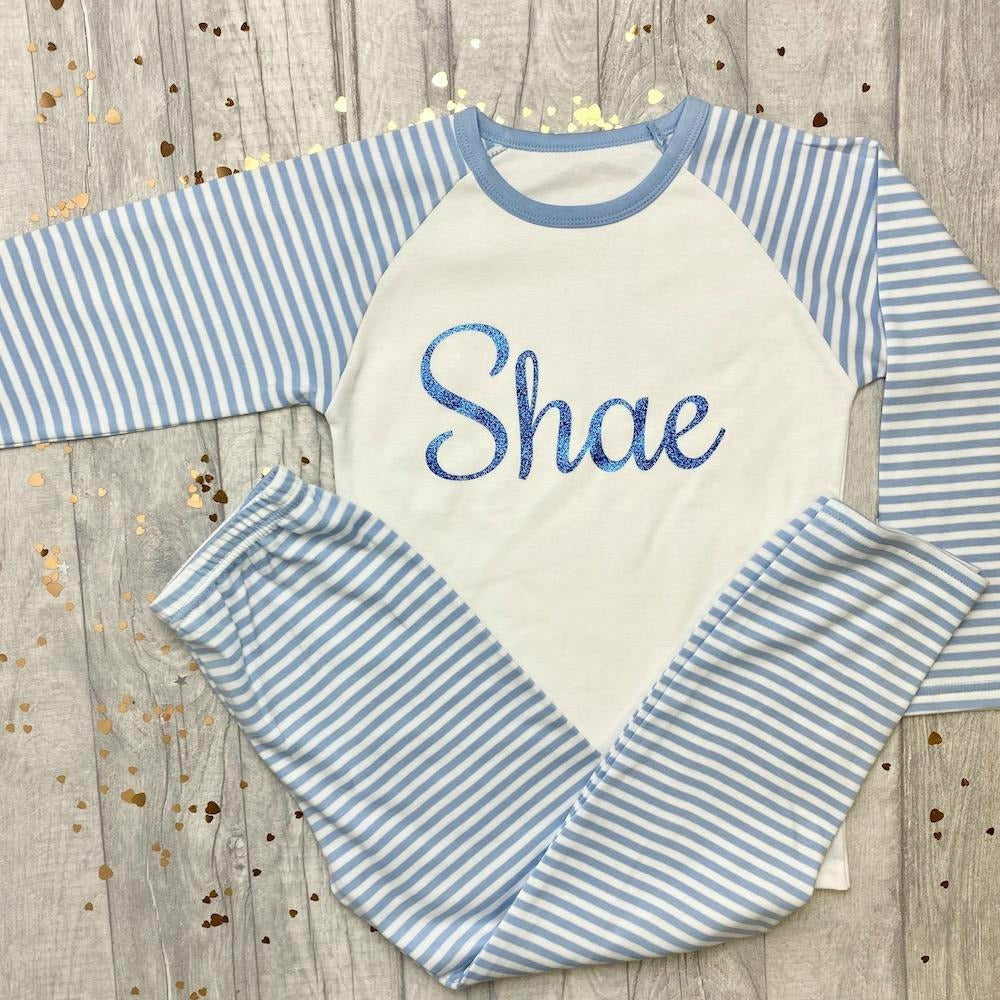 Personalised Blue and White Boys Pyjamas With Blue Glitter Text