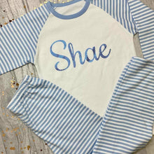 Load image into Gallery viewer, Personalised Blue and White Boys Pyjamas With Blue Glitter Text
