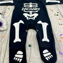 Load image into Gallery viewer, Personalised Baby Boys or Girls Full-Body Black Sleepsuit, White Glitter Halloween Skeleton
