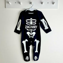 Load image into Gallery viewer, Personalised Baby Boys or Girls Full-Body Black Sleepsuit, White Glitter Halloween Skeleton
