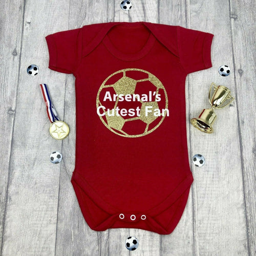 Arsenal's Cutest Fan Baby Football Romper, Red Bodysuit, Vest, featuring a gold football design with white lettering. The gunners 