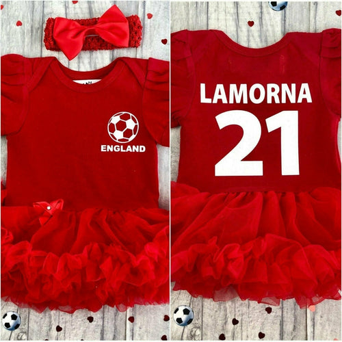 Personalised England Football Tutu Romper, red tutu featuring England football on the front and Name and number on the back both in white, Including a matching red headband. 