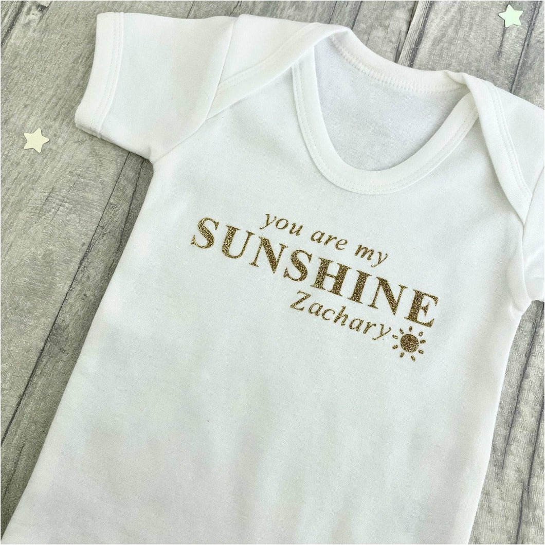 Products 'You Are My Sunshine' Personalised Baby Boys Short Sleeve Romper With Gold Glitter Sun Design
