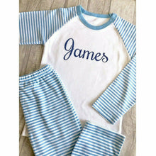 Load image into Gallery viewer, Personalised blue and white boys Pyjamas with blue glitter text
